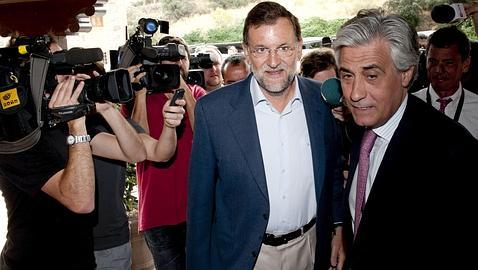 Rajoy reafirma a Camps como candidato del PP en Valencia