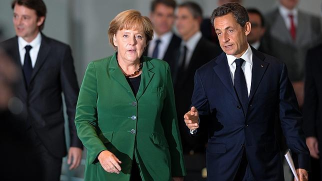 Merkel y Sarkozy pactan recapitalizar la banca y readaptar tratados de la UE