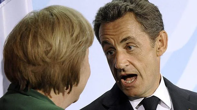 Merkel y Sarkozy ultiman el plan de castigo a la deuda española