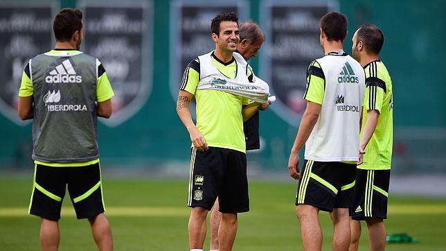 Cesc y Piqué, como si nada