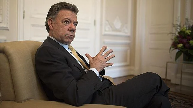 Juan Manuel Santos, durante la sesión fotográfica en el palacio presidencial de Nariño