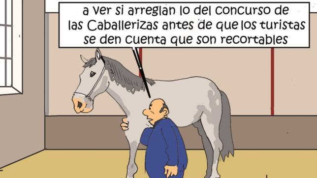 Un operario junto a un caballo de cartón en las antiugas caballerizas