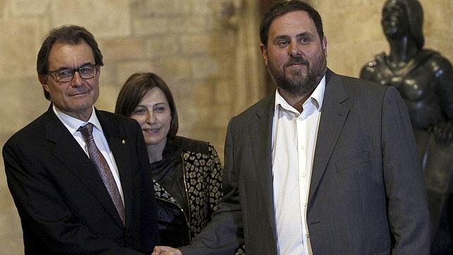 Artur Mas, Carme Forcadell y Oriol Junqueras, tras el acuerdo electoral alcanzado el pasado 14 de enero