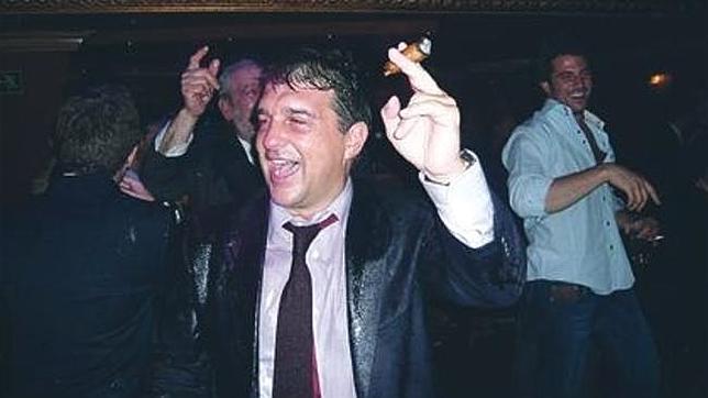 Laporta, empapado en champán y con un puro