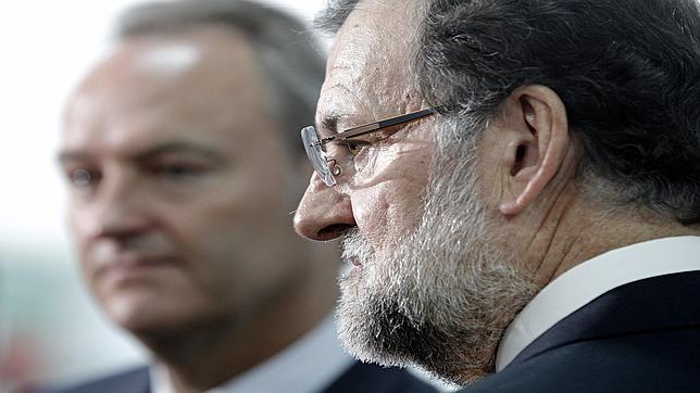 Rajoy admite los «errores» del PP en su visita a Valencia en plena crisis con Rus