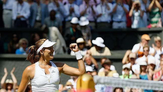 Muguruza, celebra durante la semifinal de Wimbledon