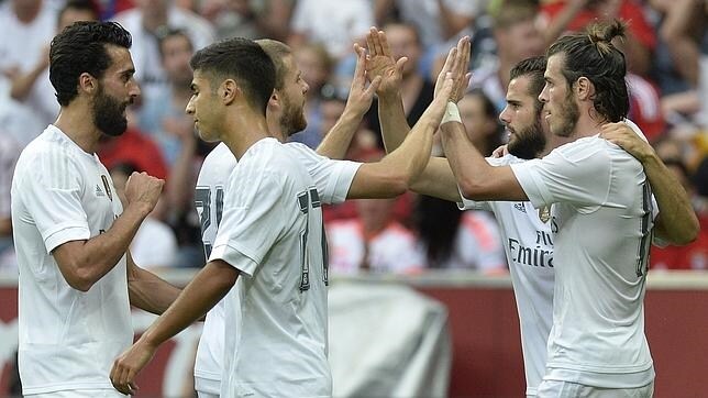 Los jugadores del Real Madrid celebran un gol durante un encuentro de pretemporada