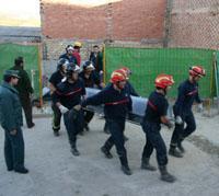 Un joven trabajador muere aplastado por un muro y otros dos quedan heridos