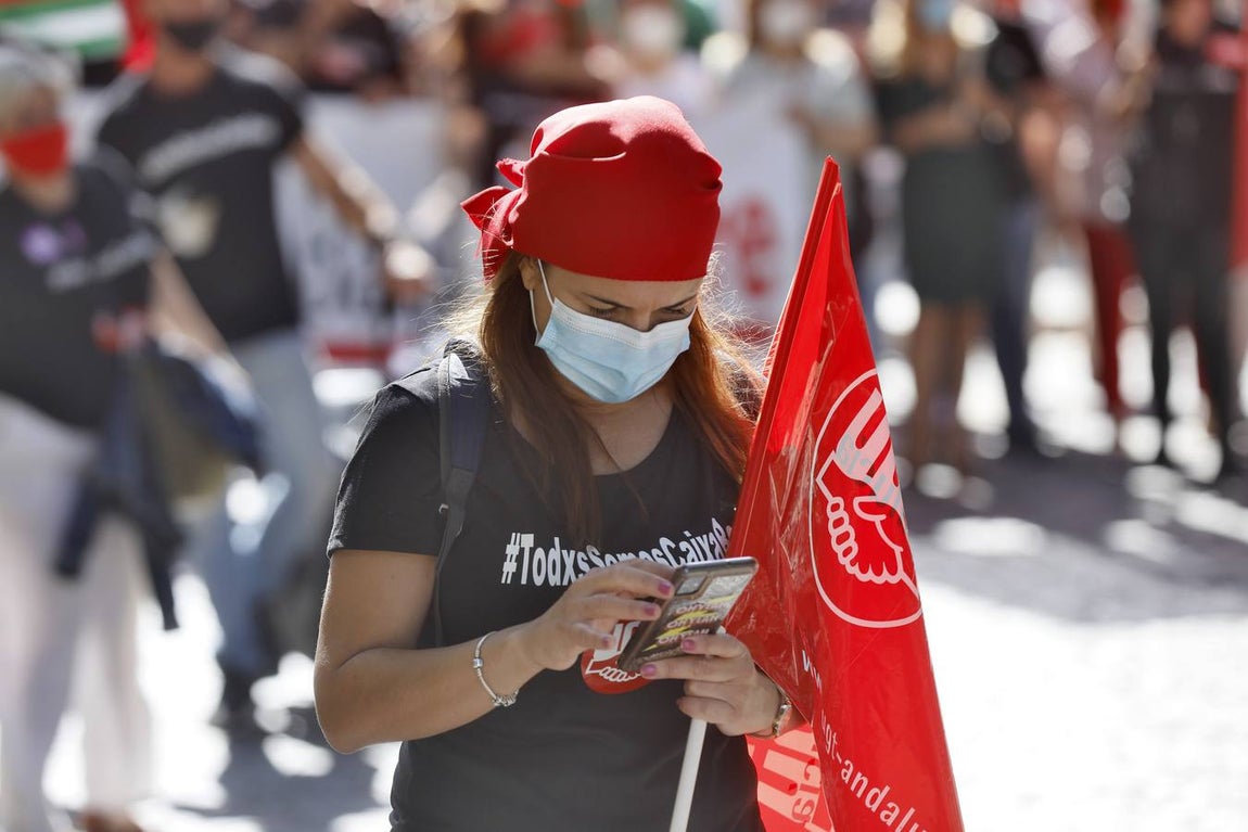 Los trabajadores de Caixabank se manifiestan en el centro de Sevilla contra los despidos forzosos en la empresa