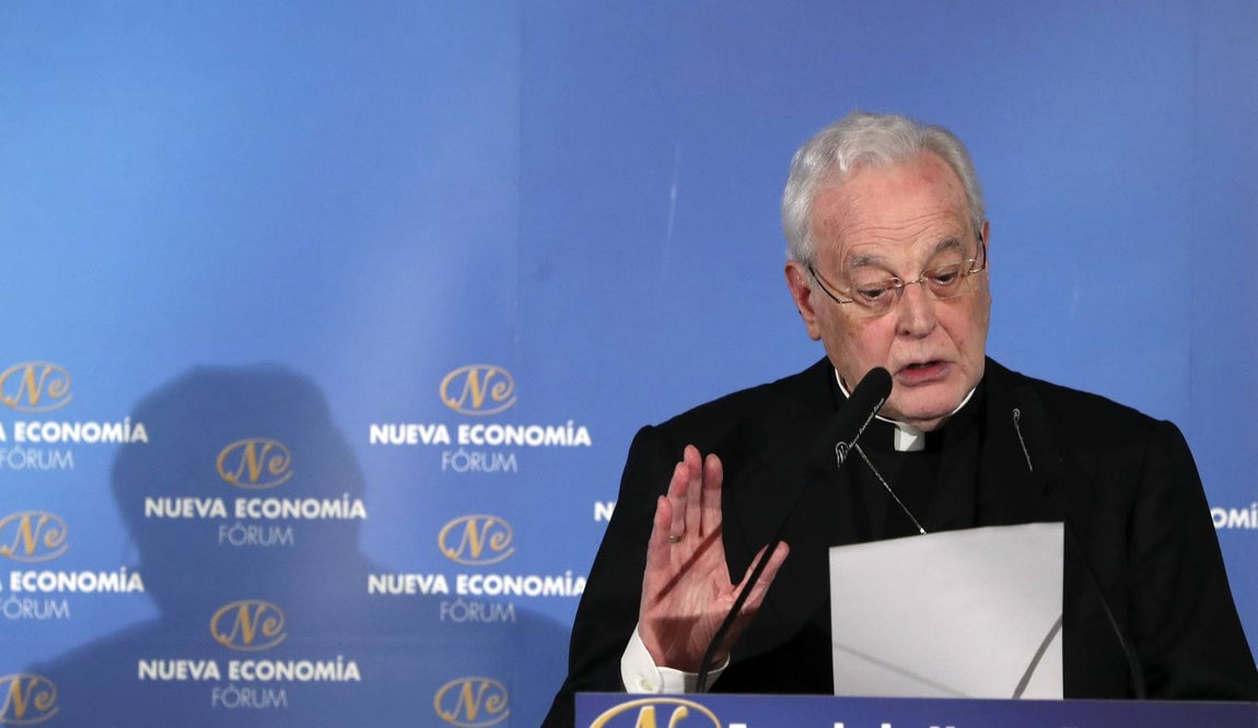El cardenal participa en el Foro de Nueva Economía. EFE