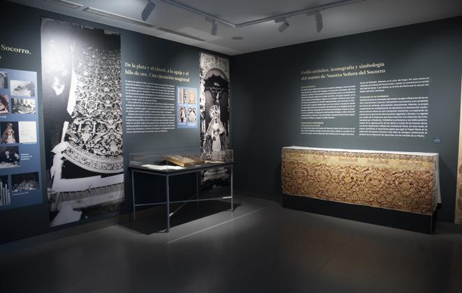 La exposición de la restauración del manto de la Virgen del Socorro del Amor