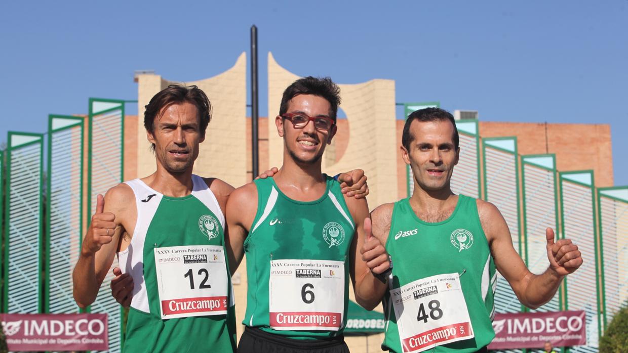 Grondona, flanqueado por Ponce y Moreno