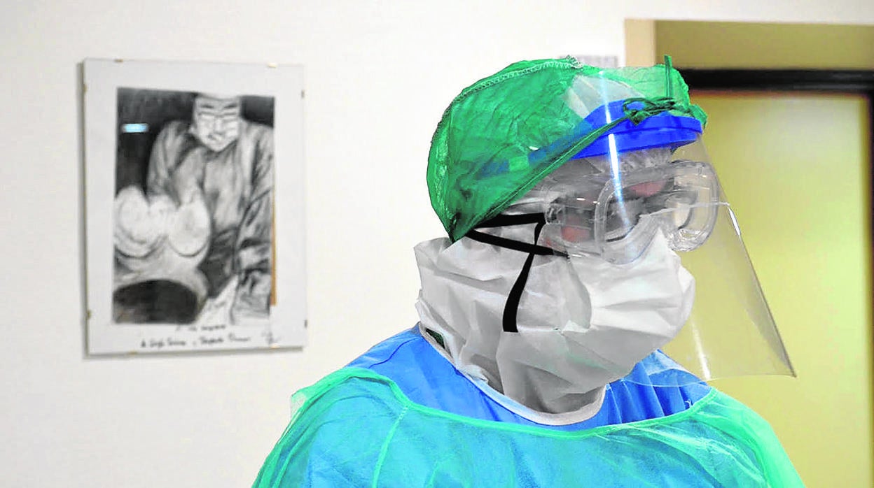 Un sanitario con una pantalla protectora elaborada en impresora 3D