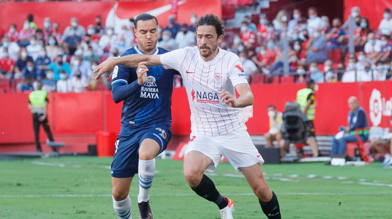 Delaney, con RDT, en el Sevilla-Espanyol