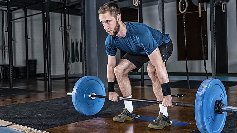 Una atleta, practicando CrossFit.