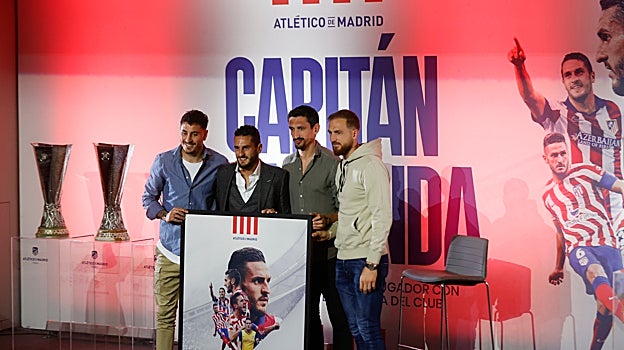 Koke, junto a Giménez, Sávic y Oblak