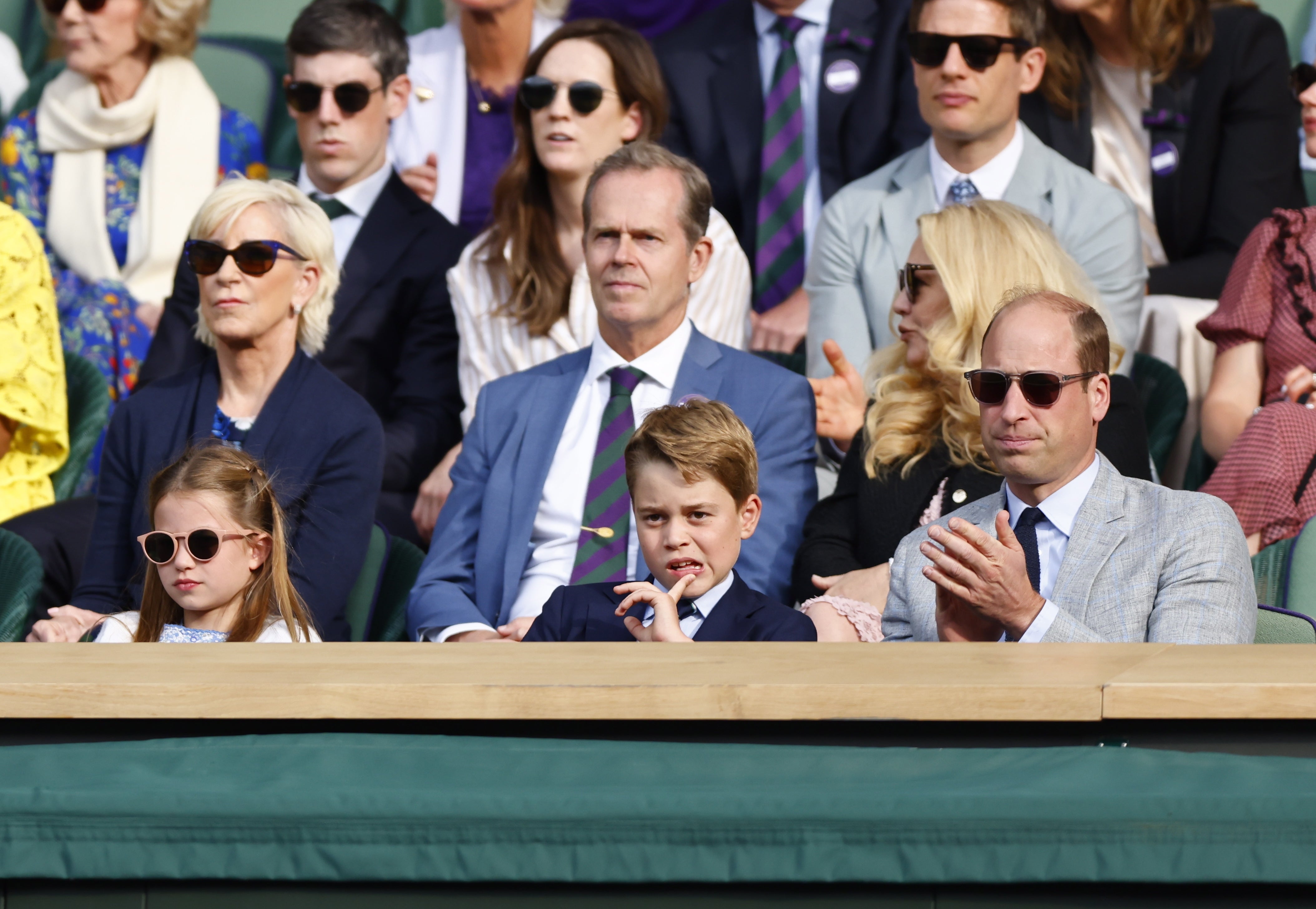 El príncipe de Gales junto con sus hijos George y  Charlotte en la final de Wimbledon.
