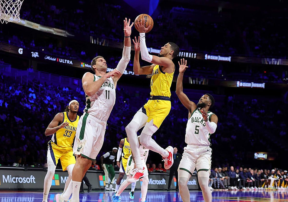 Haliburton, defendio por Brook Lopez