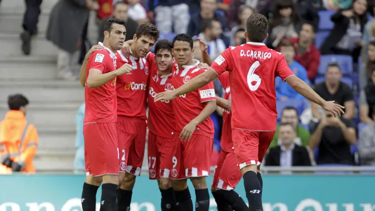 Sevilla players celebrate one of their goals against Espanyol in the 1-3 win in the 2013/14 season