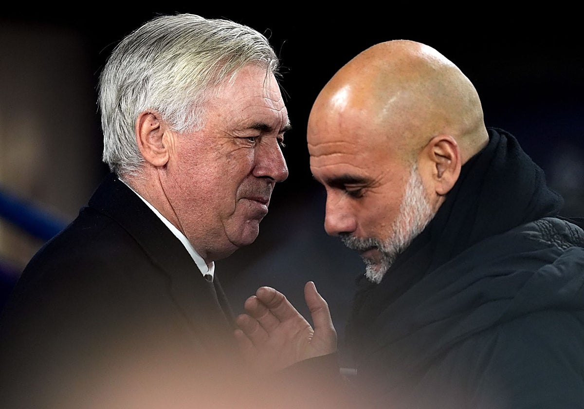 Ancelotti y Pep, saludándose antes del partido