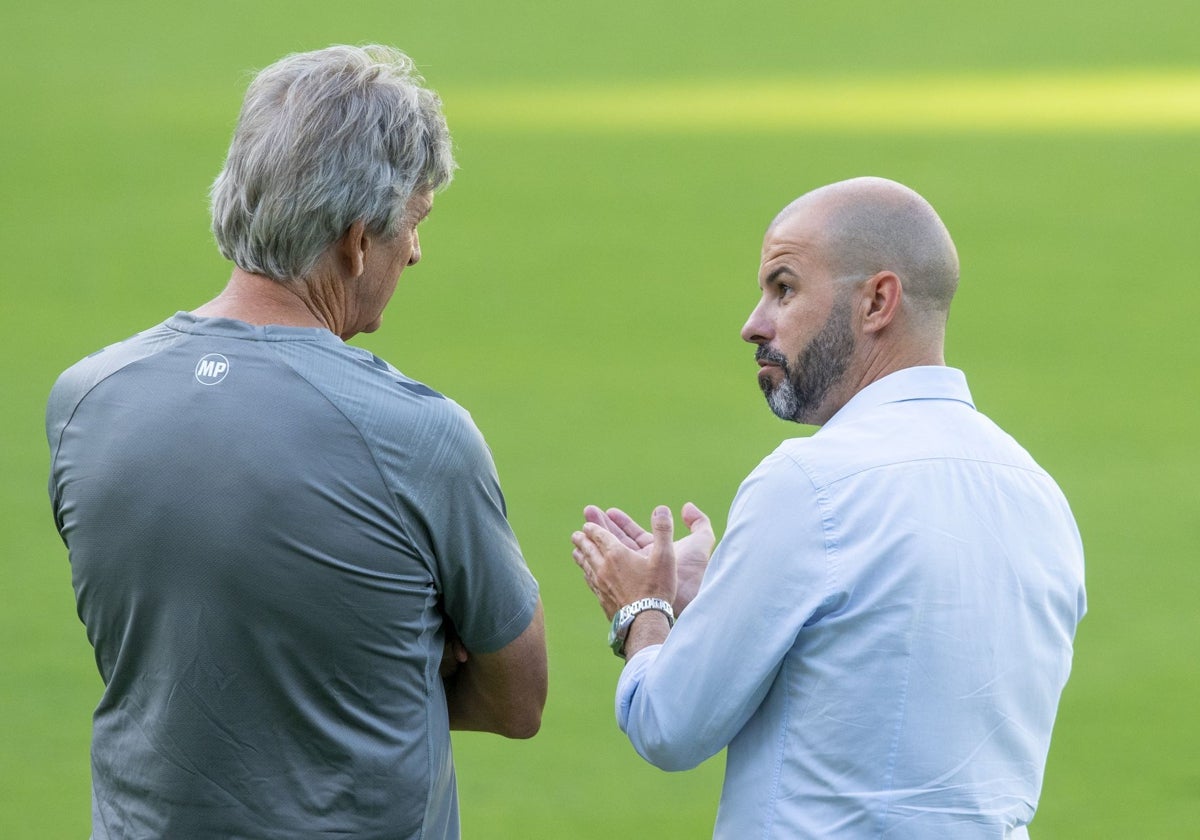 Pellegrini y Manu Fajardo, en el transcurso de un entrenamiento del Betis