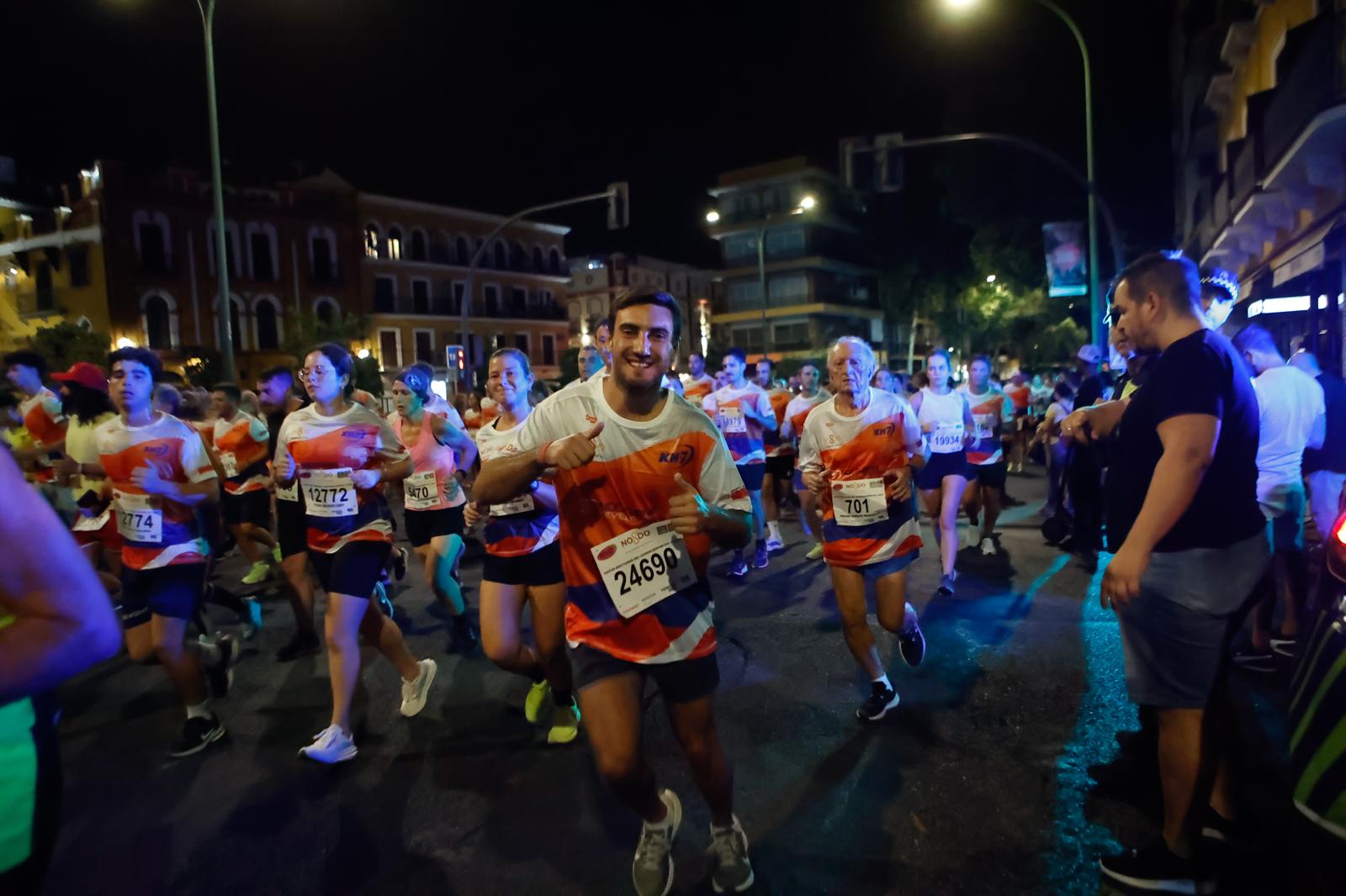 Búscate en la galería de imágenes de ABC de la Carrera Nocturna de Sevilla 2025