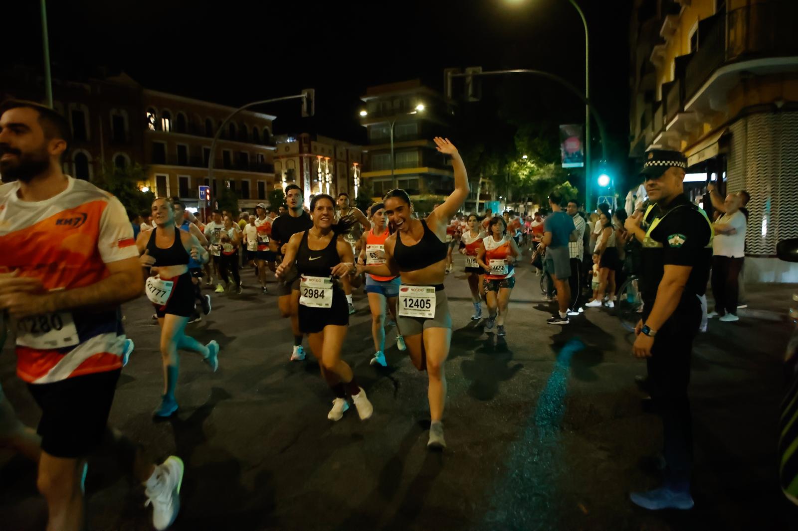 Búscate en la galería de imágenes de ABC de la Carrera Nocturna de Sevilla 2025