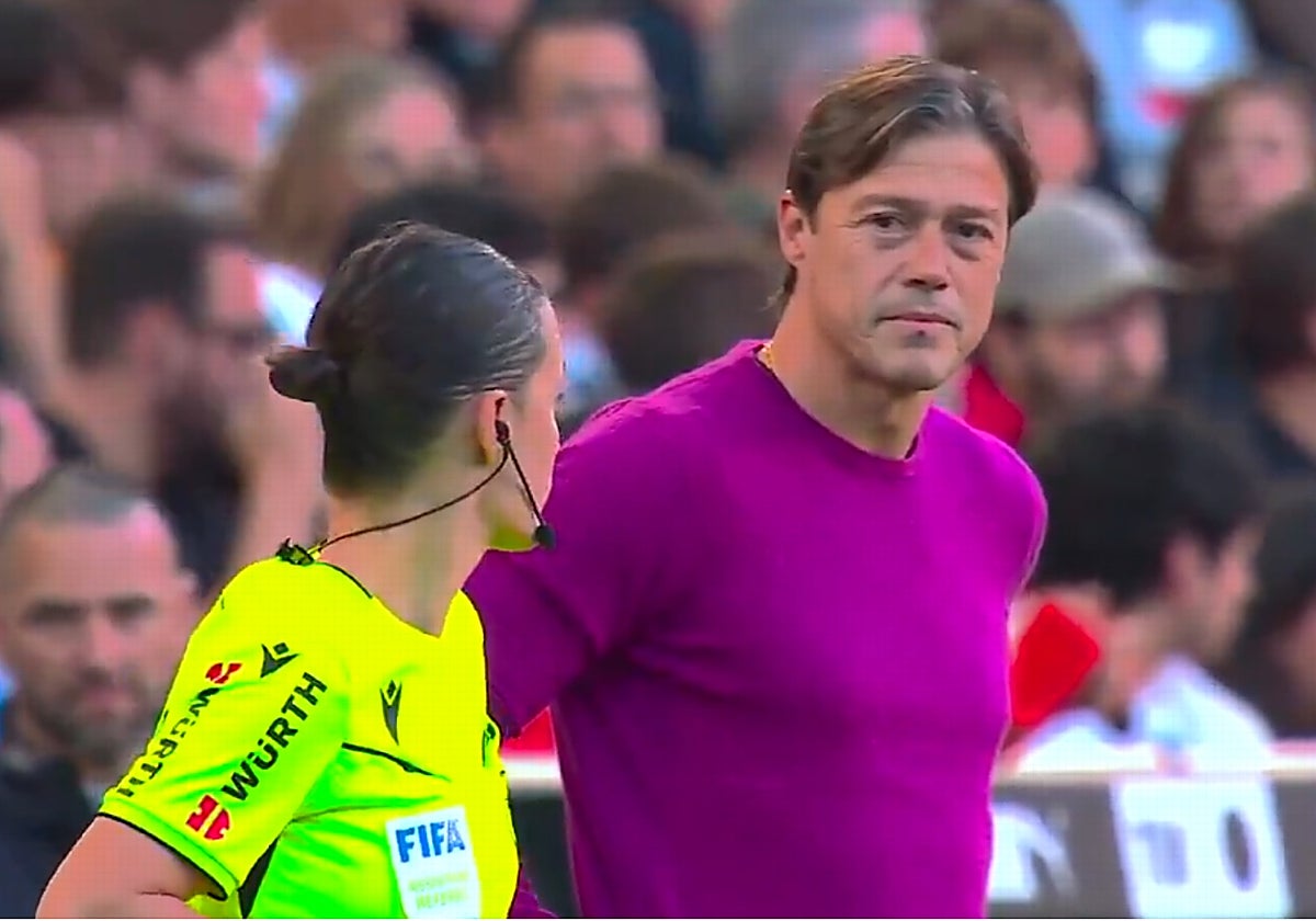 Almeyda y Guadalupe Porras, durante el Valencia - Sevilla