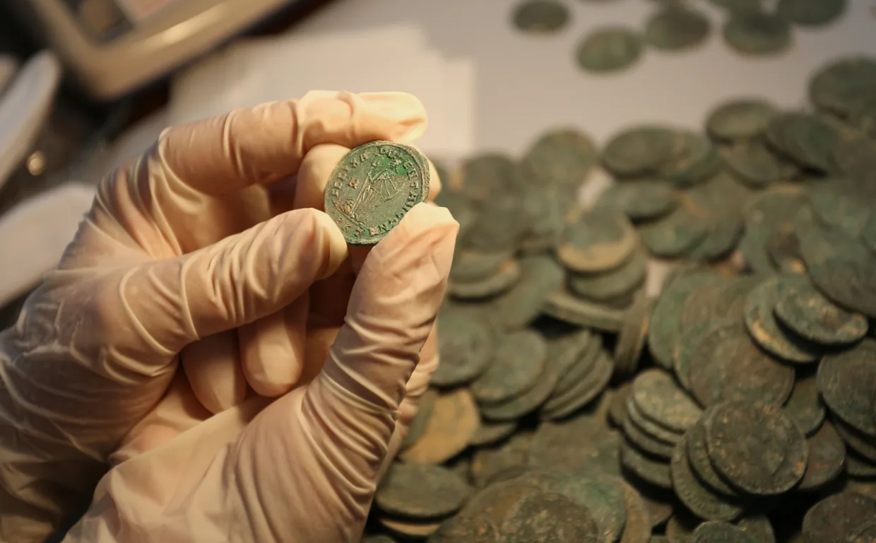 How to clean old coins without damaging them