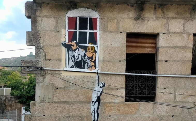Mensaje a Banksy en las fachadas de Verín
