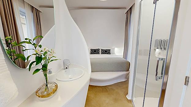 Imagen de una de las habitaciones del hotel Suite Generis