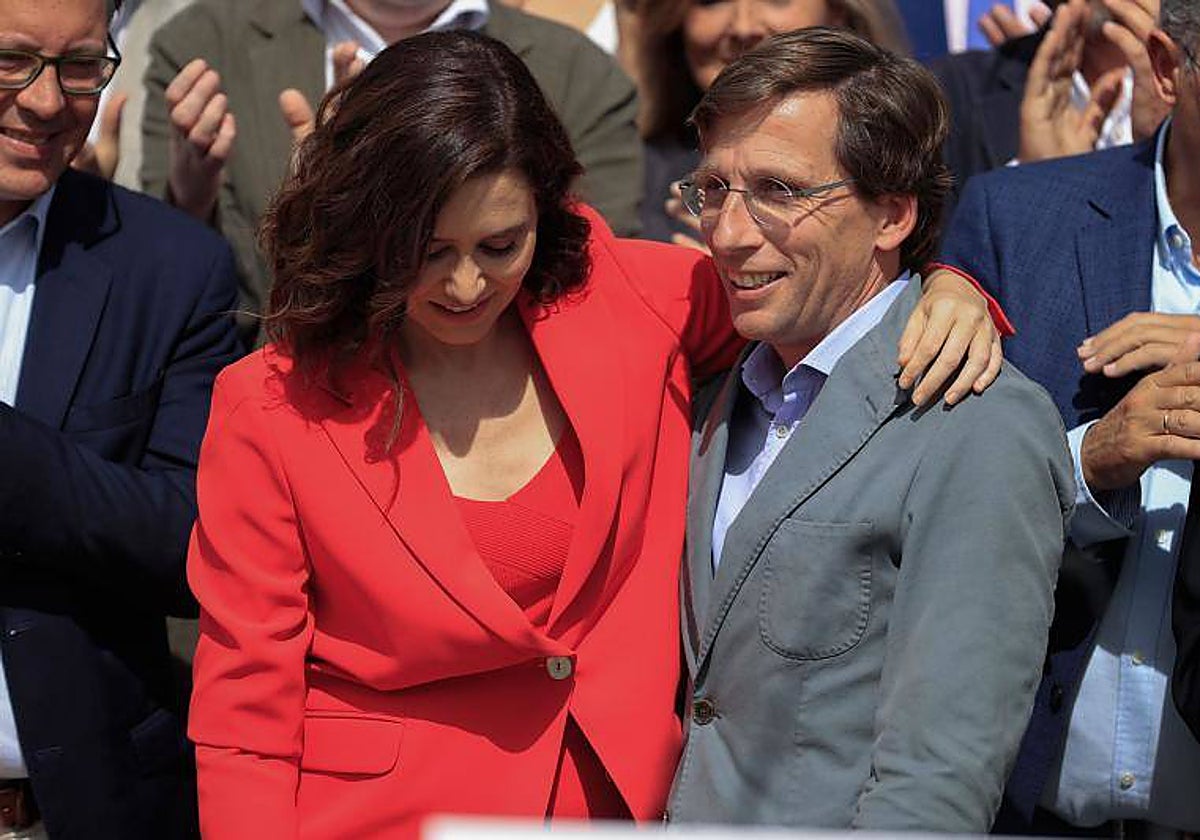 Isabel Díaz Ayuso y José Luis Martínez-Almeida, en la presentación de sus listas