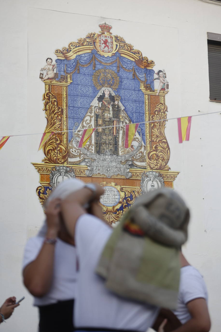 La Virgen del Carmen de San Cayetano de Córdoba siembra la alegría, en imágenes