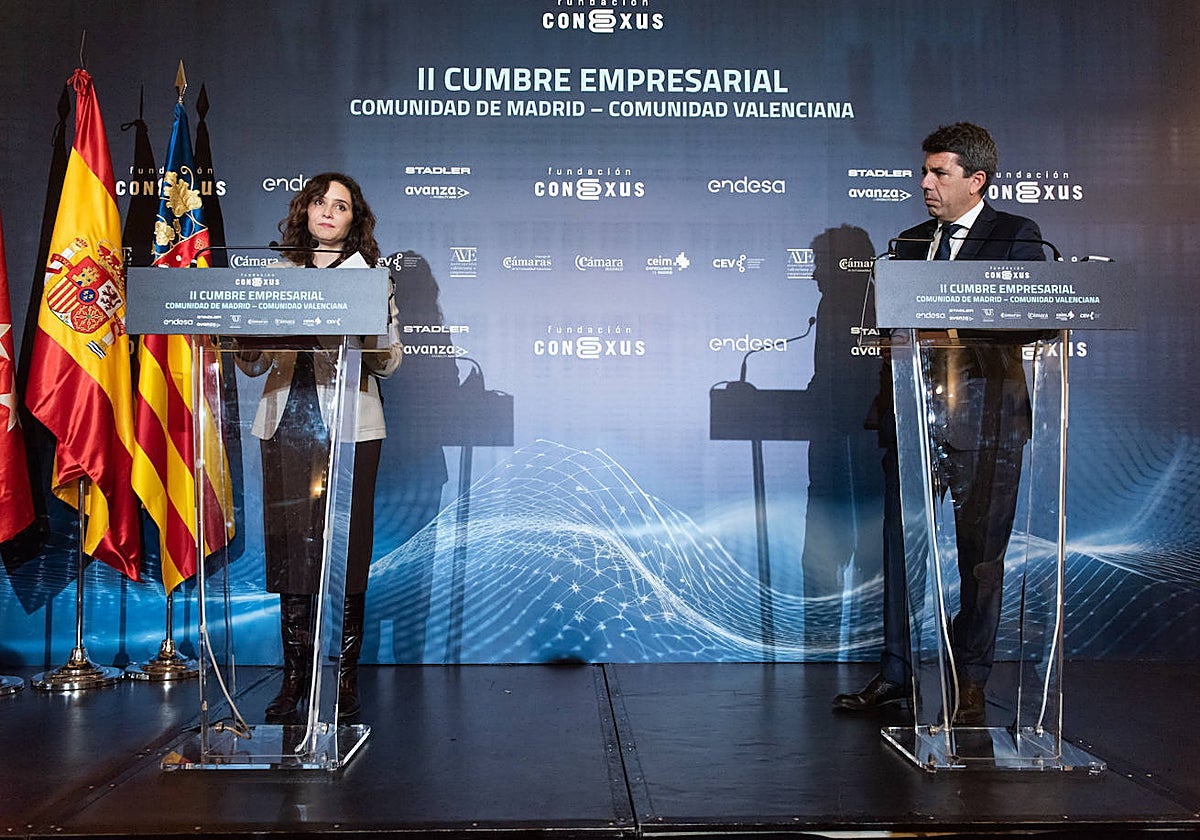 Imagen de la presidenta de la Comunidad de Madrid, Isabel Díaz Ayuso, y el presidente de la Generalitat Valenciana, Carlos Mazón, este martes en Madrid