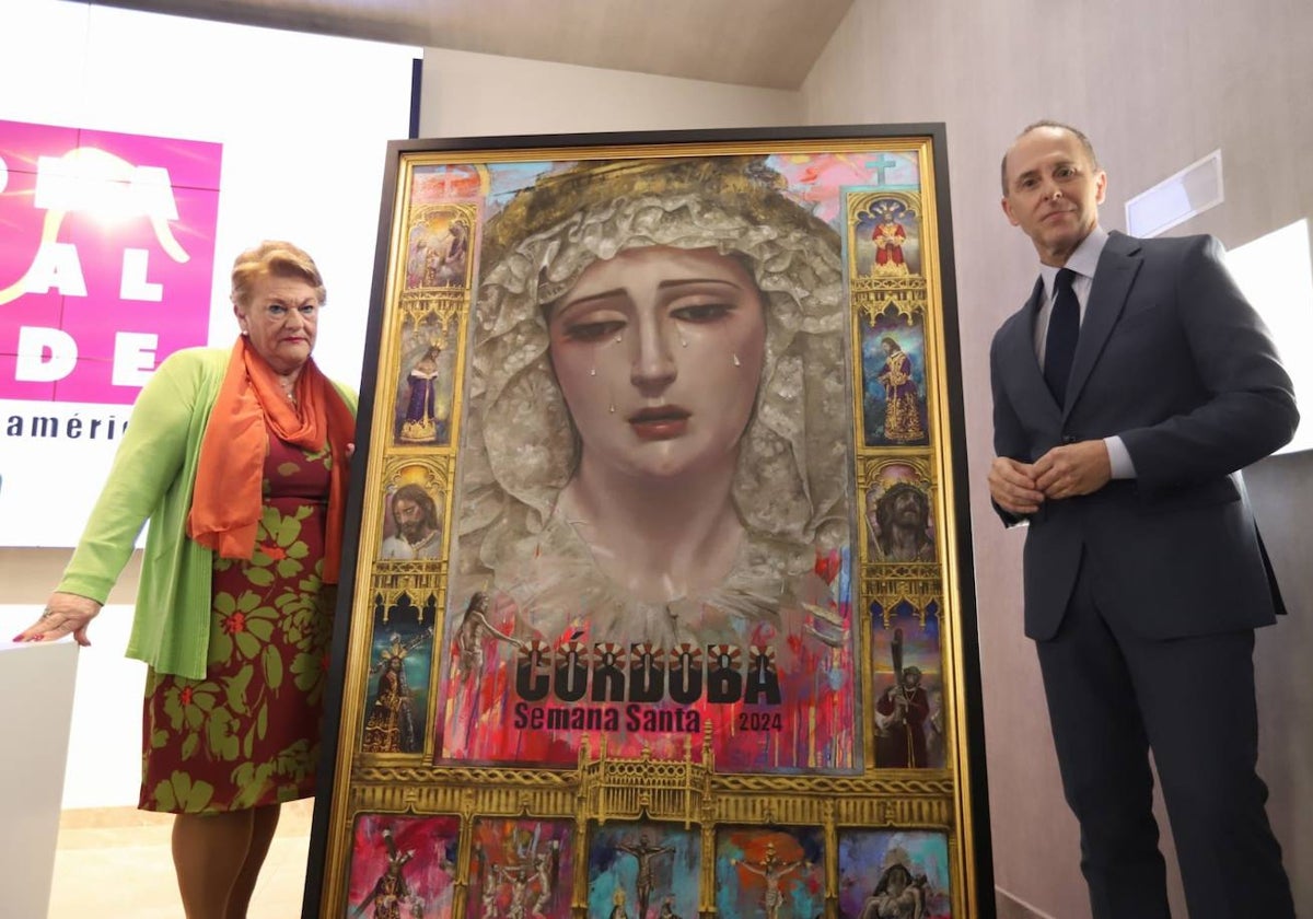 Olga Caballero y Antoine Cas, con el cartel de la Semana Santa de Córdoba 2024