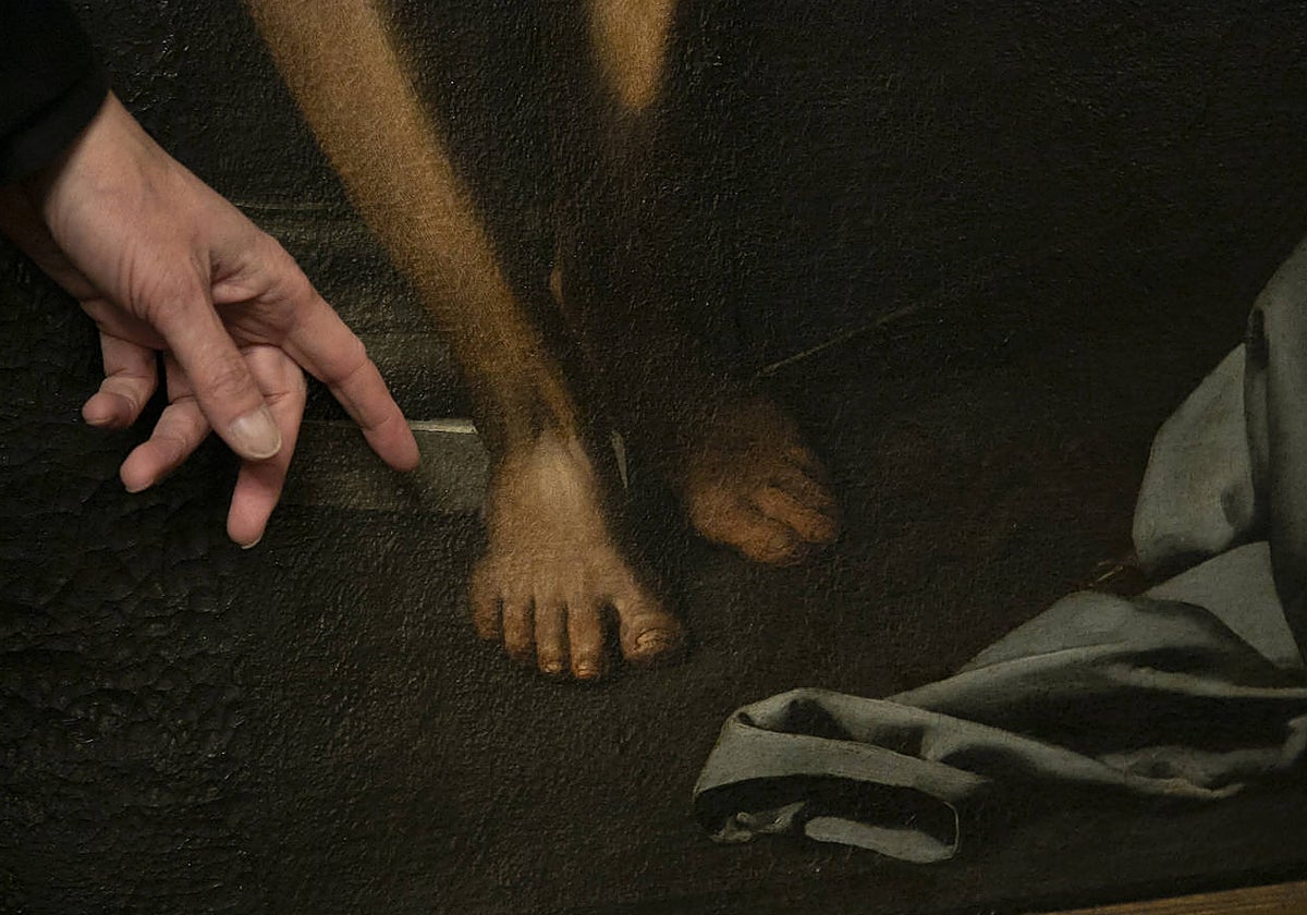Detalle de los pies de Jesús en el lienzo