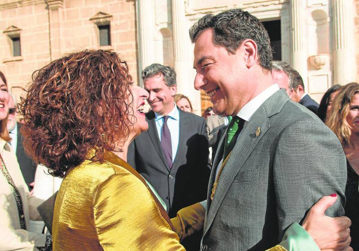 María Jesús Montero y Juanma Moreno