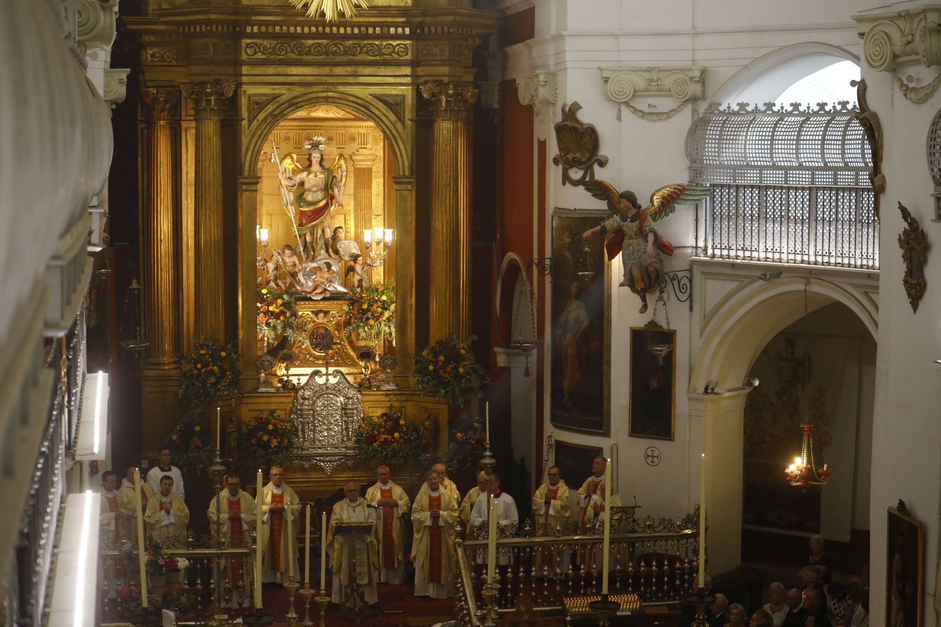 La tradicional misa de San Rafael en la iglesia del Juramento, en imágenes