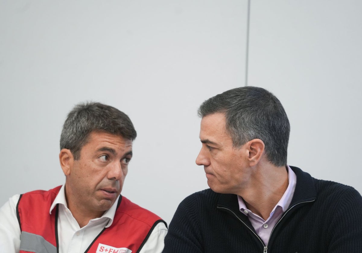 El presidente de la Generalitat valenciana, Carlos Mazón, y el presidente del Gobierno, Pedro Sánchez