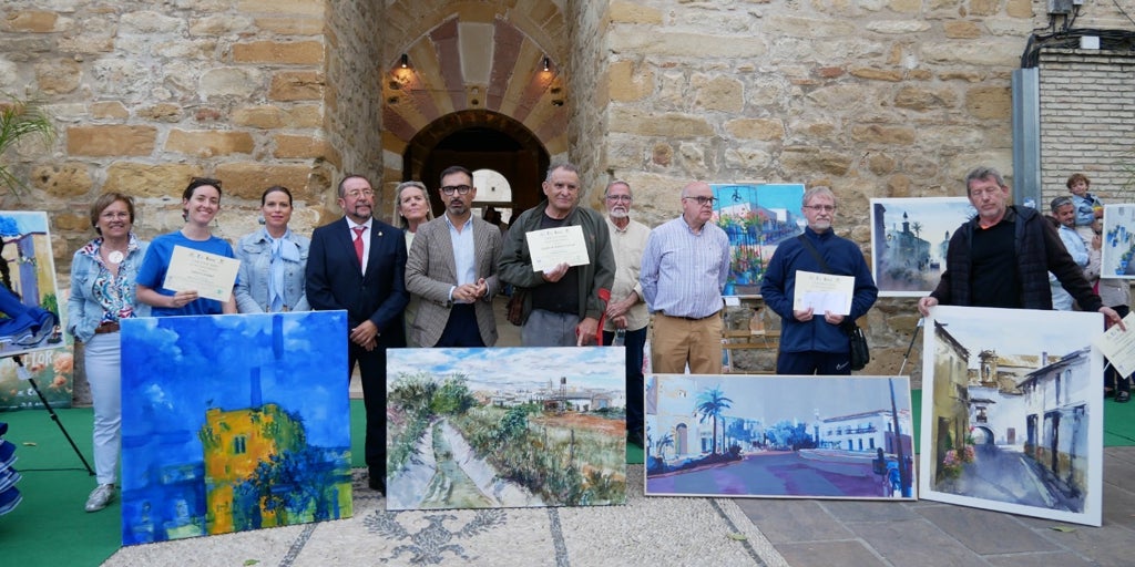 Dieciséis artistas pintan la belleza de Cañete de las Torres en su festival de 'Calles en flor'