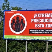 Retiran la polémica pancarta que Vox había colocado en una valla a la entrada de Huesca alertando de que PP y PSOE «reparten ilegales»