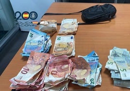 El botín en metálico recuperado del atraco del ladrón al que se le caían los billetes por la calle