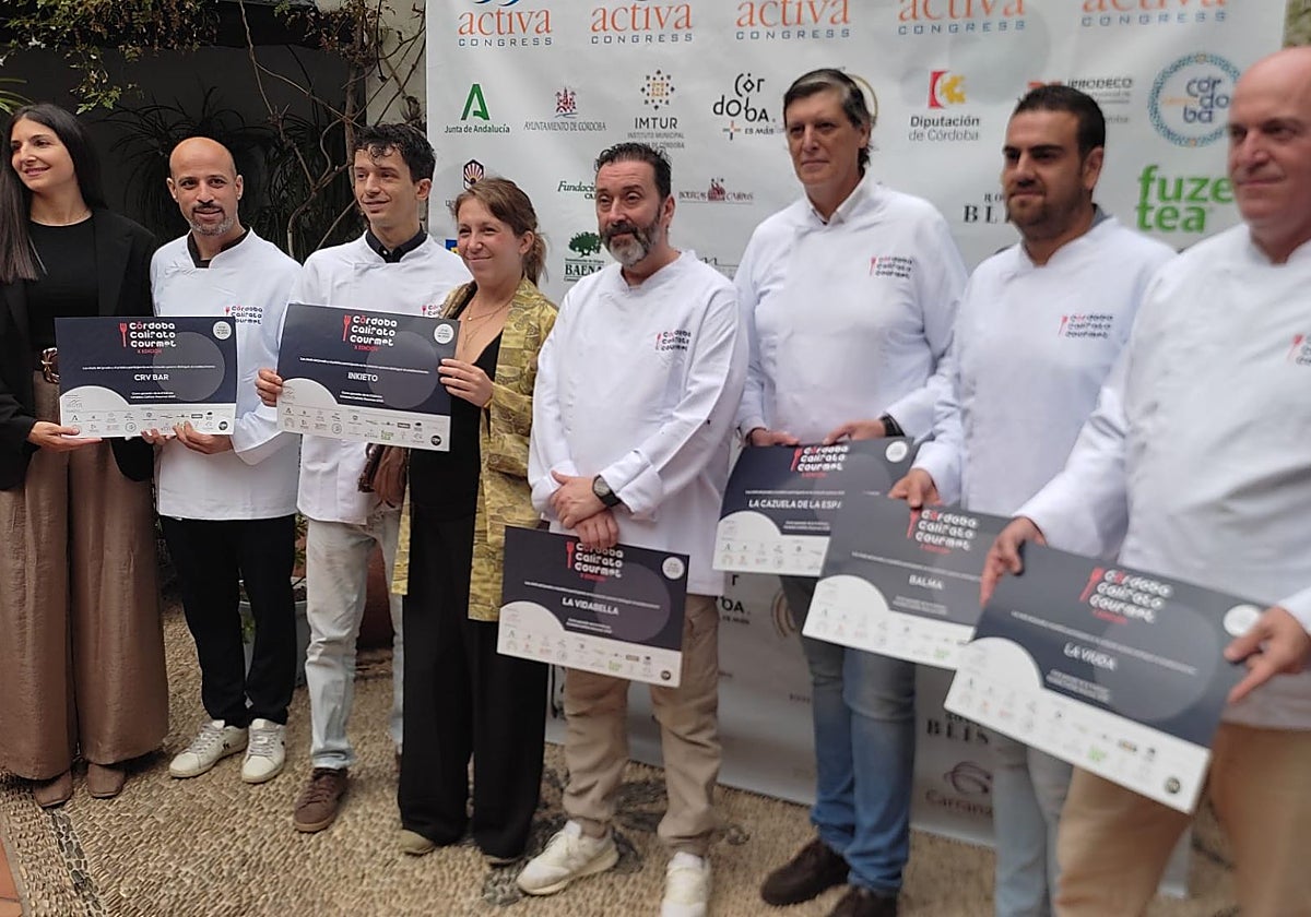 Los premiados, con sus galardones