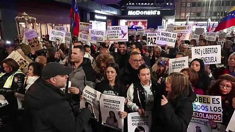 Cientos de personas marchan en Madrid por "la paz y la libertad" en Venezuela