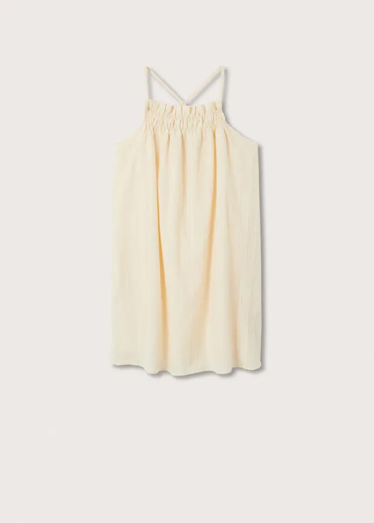 Vestido corto 100% algodón en color blanco roto de Mango. Precio: 12,99€ (antes 29,99€).
