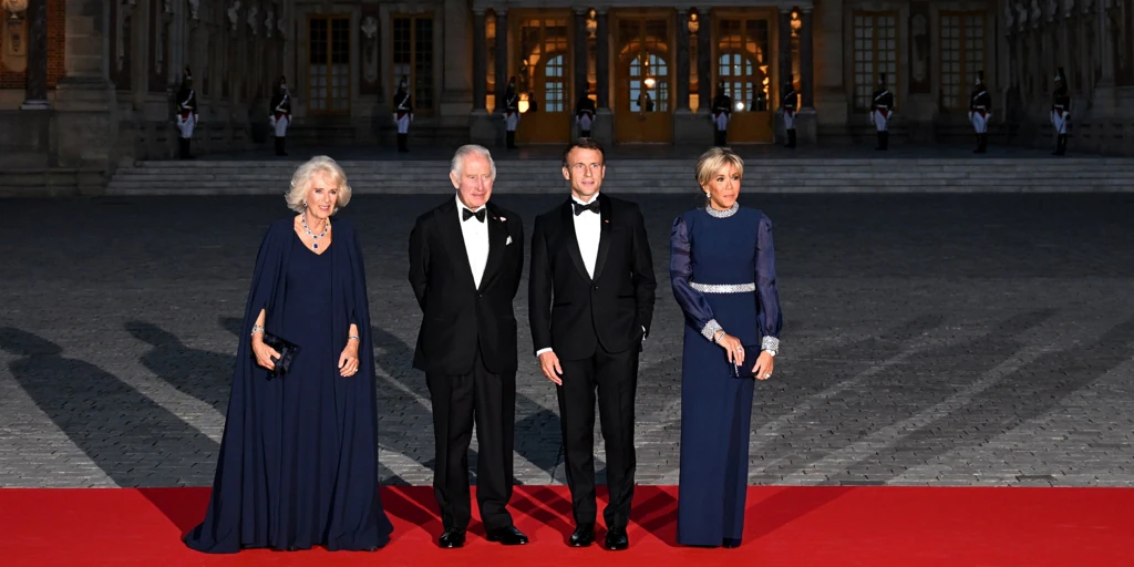 Queen Camilla and Brigitte Macron Shine in Fashionable Duel at Gala Dinner in Versailles