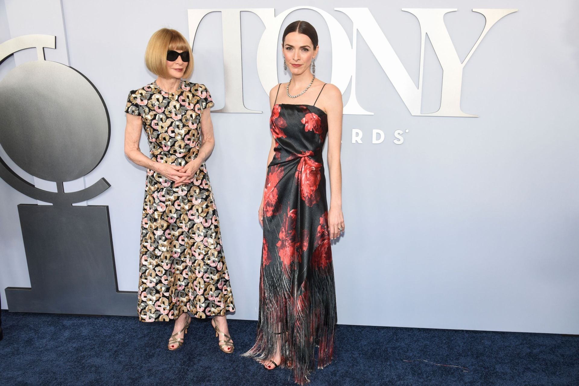 Anna Wintour y Bee Carrozzini ambas con distintos diseños con estampado floral.