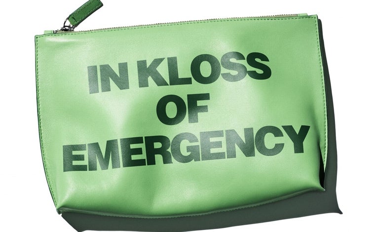 Main image - Karlie Kloss toiletry bag, Harry Lambert hat, and Pierpaolo Piccioli surfboard