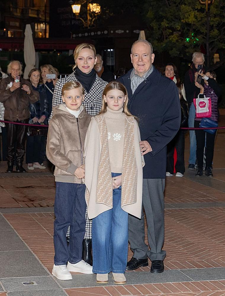 The Princes of Monaco and their children during the lighting of the Principality's Christmas lights.