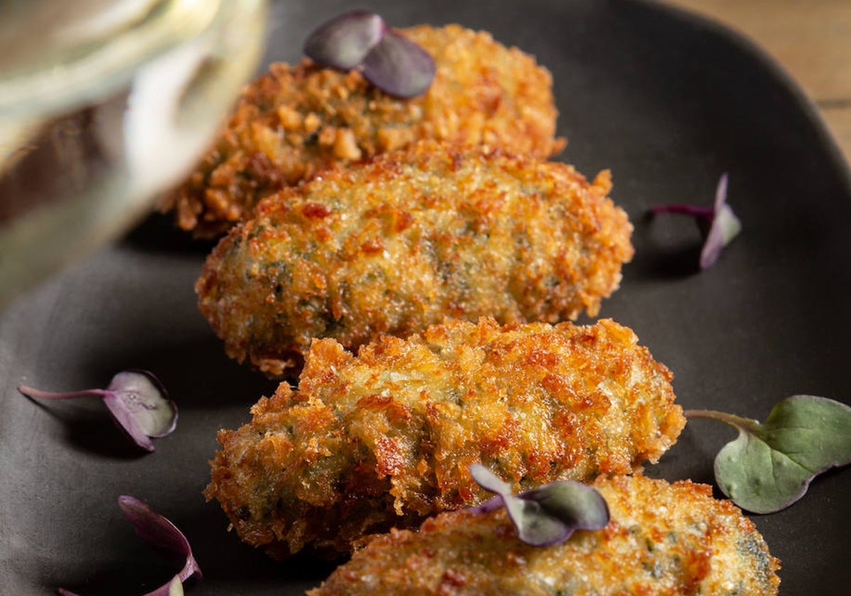 Croquetas de jamón ibérico y de espinacas con ricotta, en Madrí Madre